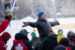 Avalanche dog instructor leads students in an exercise 