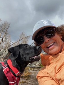 Black lab with dog handler 